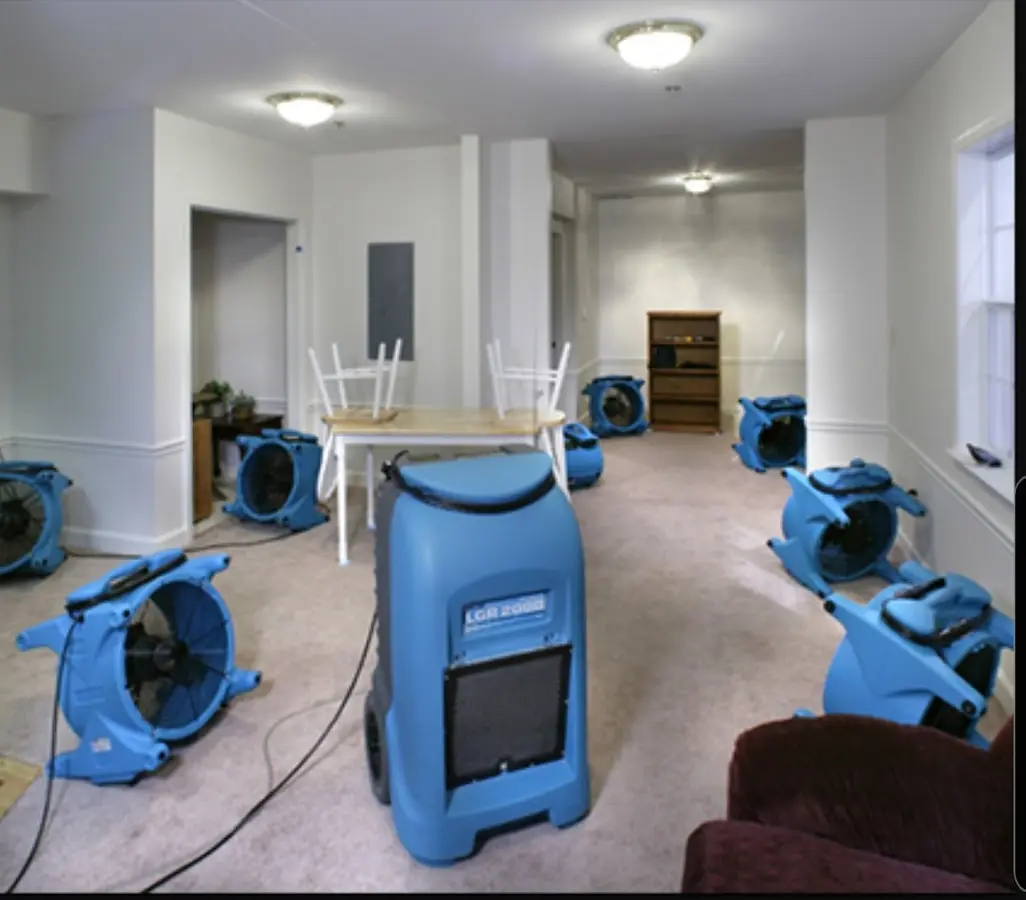 Air movers and dehumidifier setup for Water Damage Restoration in Gouverneur
